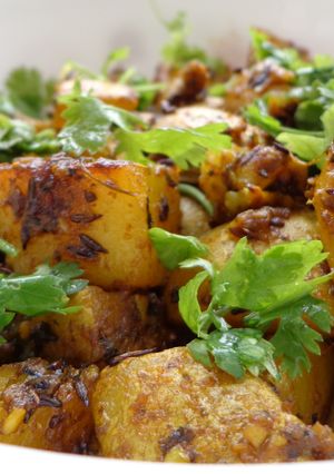A picture of Potatoes fried with skin.