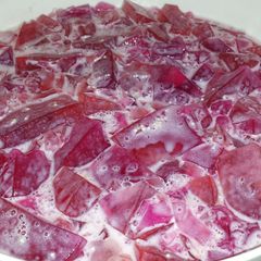 A picture of 3 flavoured Jelly with Strawberry Whip.