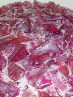 A picture of 3 flavoured Jelly with Strawberry Whip.