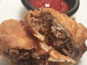 A picture of cheesesteak egg rolls