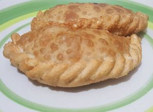 Una foto de Empanadas fritas de carne con ollucos