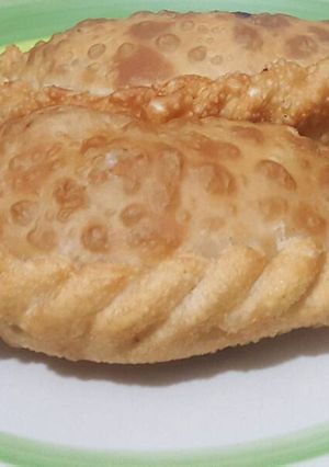 Una foto de Empanadas fritas de carne con ollucos