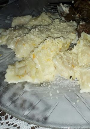 Una foto de Ravioles de zapallo en salsa blanca deliciosa