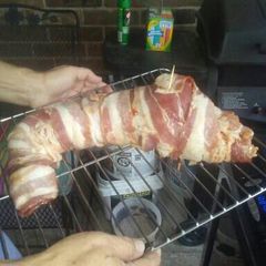 A picture of Smoked bbq bacon wrapped rabbit.