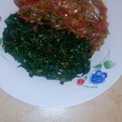Stewed omena with greens A picture of Stewed omena with greens.