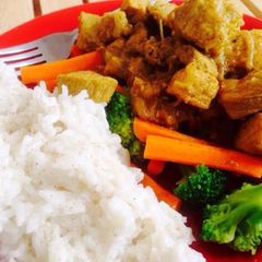 A picture of Tangy Pork Curry with Coconut Rice.