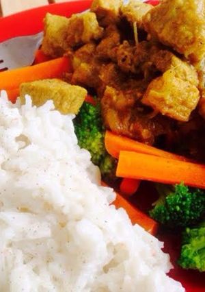 A picture of Tangy Pork Curry with Coconut Rice.