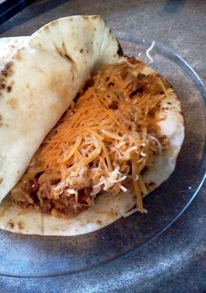 A picture of Breakfast Papas con Huevos y Chorizo Mexicano.