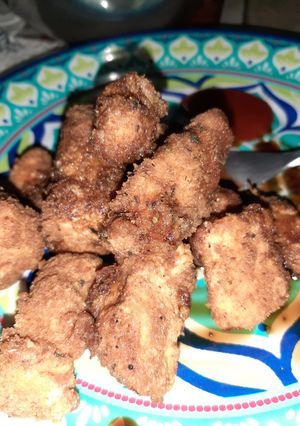 Una foto de Fritos de salmón