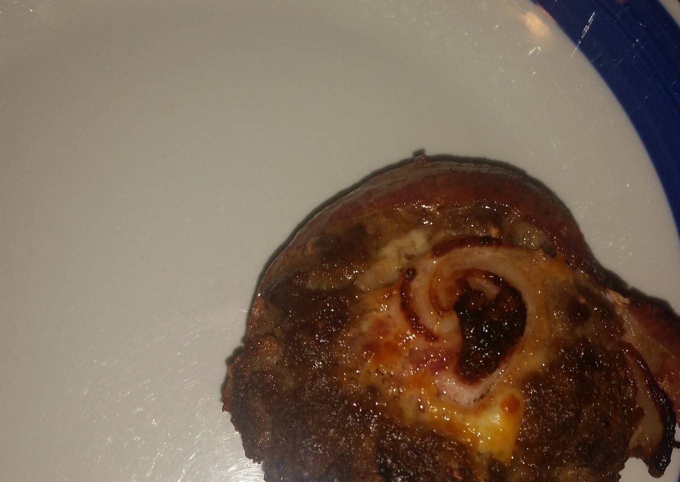 Cheeseburger with rolled bacon