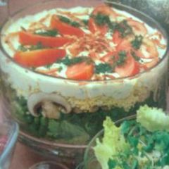 A picture of Layered creamy garden salad.