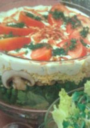 A picture of Layered creamy garden salad.