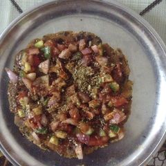 A picture of Paratha Pizza(or Paratha With Salad Topping).
