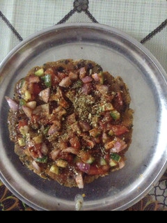 A picture of Paratha Pizza(or Paratha With Salad Topping).