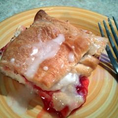 A picture of Cherry danish desert.