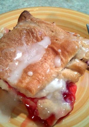 A picture of Cherry danish desert.