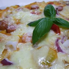 A picture of Our Family's Easy Recipe For Pizza To Serve To Guests.