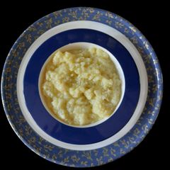 A picture of HOMEMADE UNSWEETENED MILK MAWA (MILK SOLIDS) in Microwave.