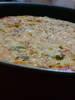 A picture of Rice casserole with eggs.