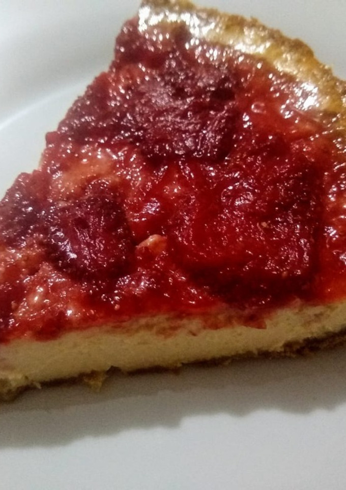 Una foto de Pay de queso y fresas