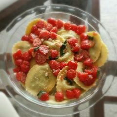 A picture of Delicious Ravioli (butter,garlic,basil &cherry tomatoes).