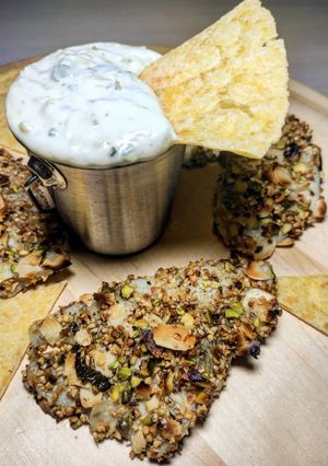 Foto di Platessa in crosta di frutta secca con Tzatziki