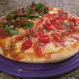 Pizza de Rúcula y Tomatitos Cherry