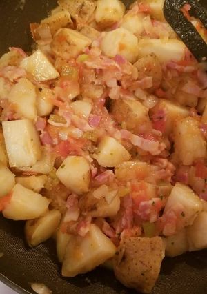 Una foto de Papás guizadas con tocino "fácil y deliciosas"