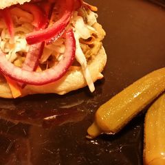 A picture of Iz's Shredded Pork and Slaw on Ciabatta.