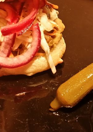 A picture of Iz's Shredded Pork and Slaw on Ciabatta.