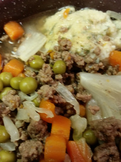 A picture of Vegetable Beef Soup with Egg Dumplings.