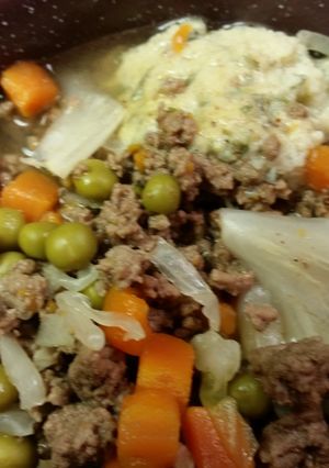A picture of Vegetable Beef Soup with Egg Dumplings.