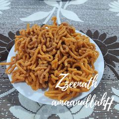 Rice Flour Murukku with Carom and Sesame Seeds A picture of Rice Flour Murukku with Carom and Sesame Seeds.