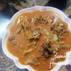 A picture of Hyderabadi Goat Head Curry.