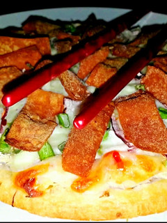 A picture of Mike's Crab Rangoon Pizza.