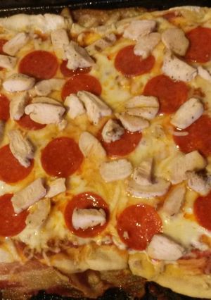 A picture of Bacon crusted pizza.