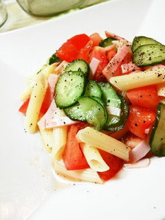 A picture of Chilled Tomato and Penne Pasta Salad.