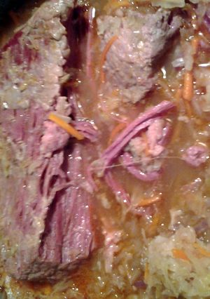A picture of cornbeef and shredded cabbage.
