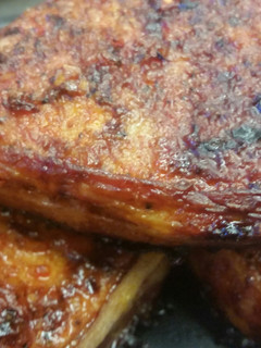 A picture of Bacon Wrapped Sriracha Pork Chops.