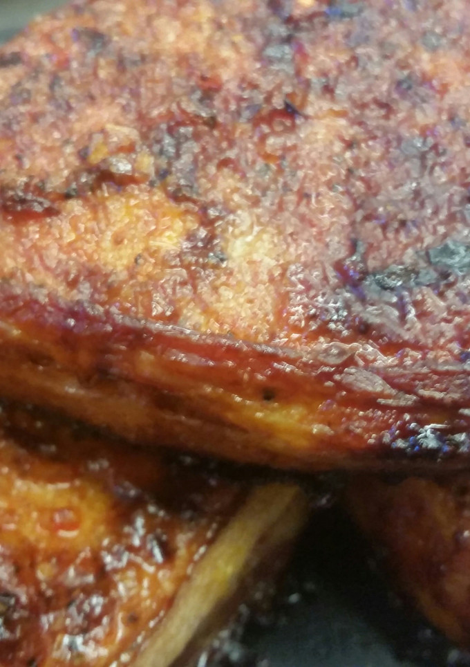 A picture of Bacon Wrapped Sriracha Pork Chops.