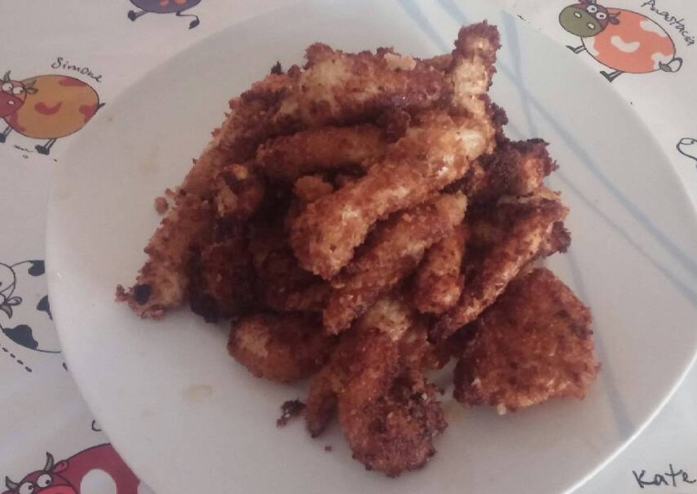 423.Pechugas de pollo rebozadas con pan rallado o cereales