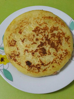 Una foto de Tortilla de patata rellena
