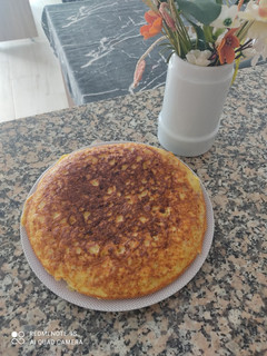 Una foto de Tortilla de patata con tacos de jamón serrano