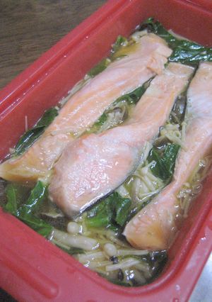 A picture of Easy Microwave-Steamed Salmon and Mushrooms in a Silicone Steamer.