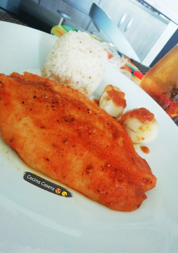 Una foto de Filete de basa en salsa 🐟 🤩 😜