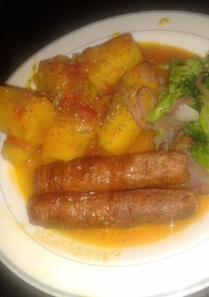 A picture of Matoke stew with sausages.