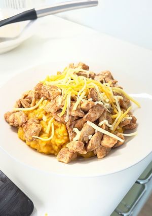 Una foto de Arroz meloso con crema de calabaza y jengibre y pollo a la miel con canela
