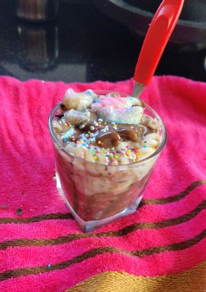 A picture of White and chocolate Pasta dessert.