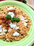 Risotto salsiccia, piselli eStracciatella di bufala