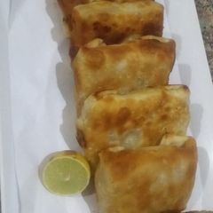 A picture of Chicken cheese packet roll.
